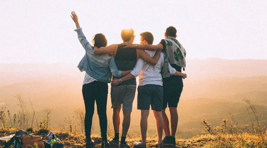 Four friends enjoy a sunrise sober