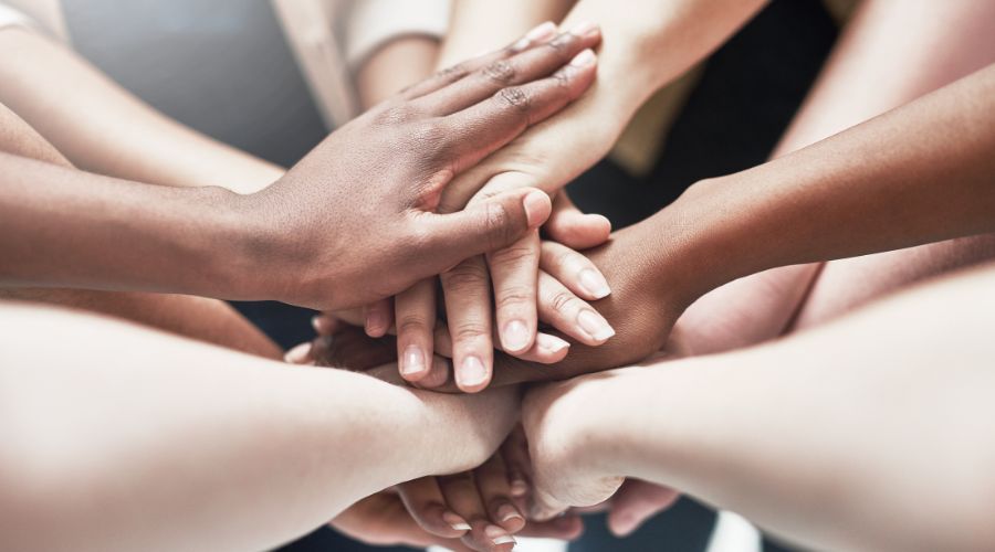 Hands together shows the concept of a robust support system