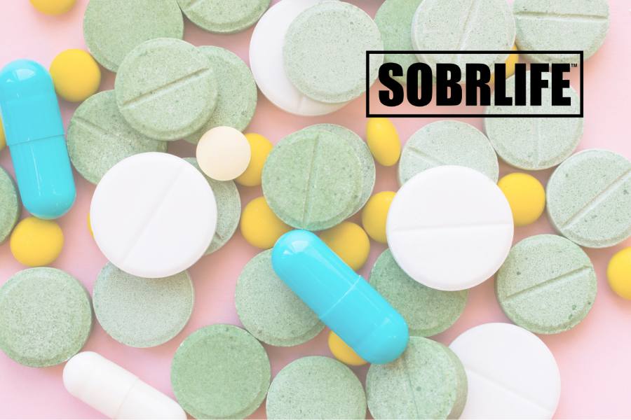 Stimulant pills strewn show the concept of Adderall abuse stories